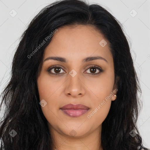 Joyful latino young-adult female with long  brown hair and brown eyes