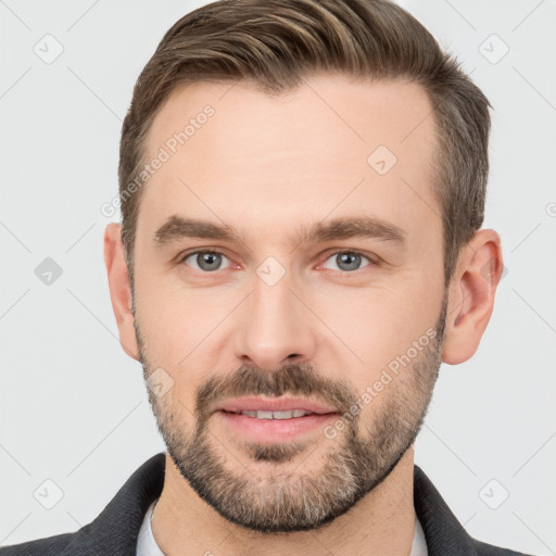 Joyful white young-adult male with short  brown hair and brown eyes