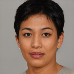 Joyful asian young-adult female with short  brown hair and brown eyes