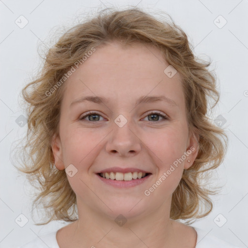 Joyful white child female with medium  brown hair and blue eyes