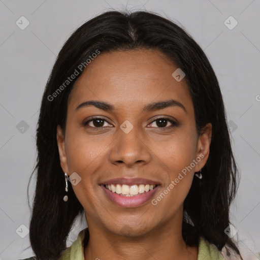 Joyful black young-adult female with medium  brown hair and brown eyes