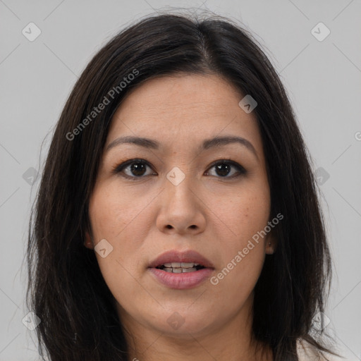 Joyful asian young-adult female with long  brown hair and brown eyes