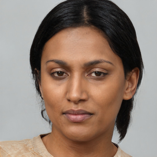 Neutral asian young-adult female with medium  black hair and brown eyes