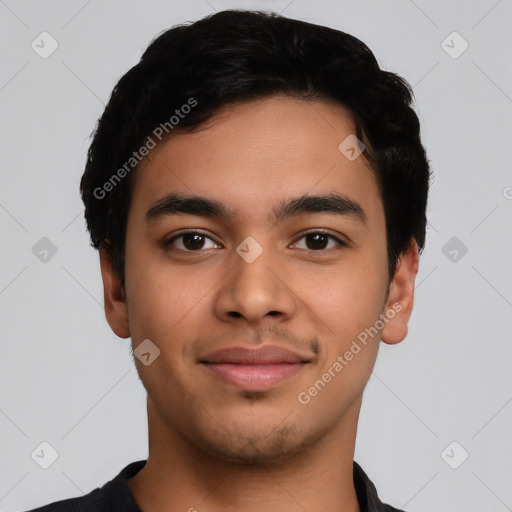 Joyful latino young-adult male with short  black hair and brown eyes