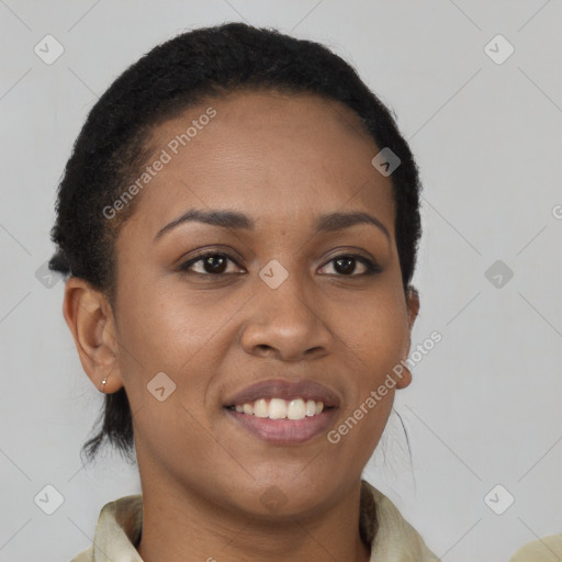 Joyful black young-adult female with short  brown hair and brown eyes