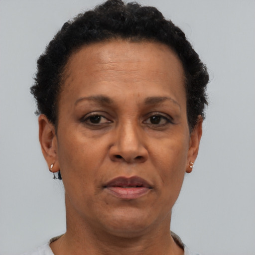 Neutral black adult female with short  brown hair and brown eyes