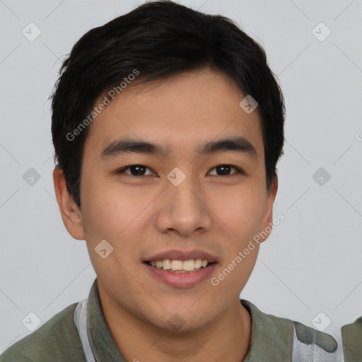 Joyful asian young-adult male with short  black hair and brown eyes