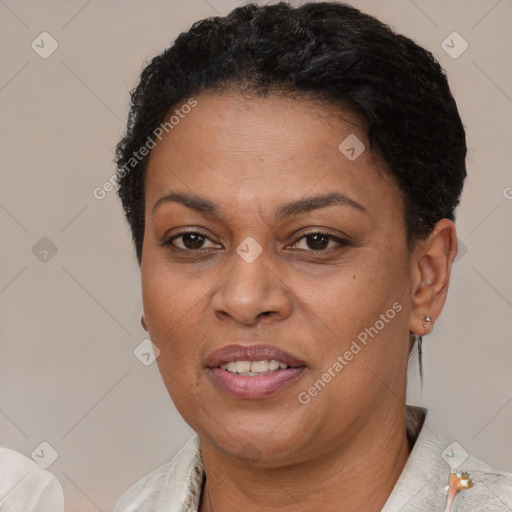 Joyful latino adult female with short  brown hair and brown eyes