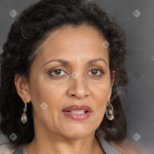 Joyful white adult female with long  brown hair and brown eyes