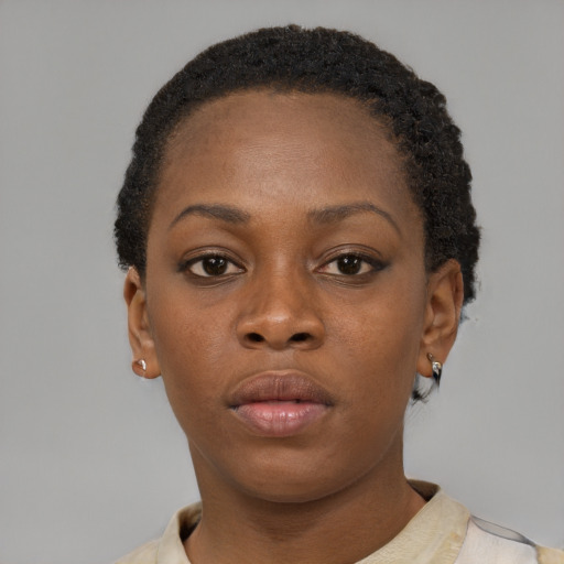 Neutral black young-adult female with short  brown hair and brown eyes