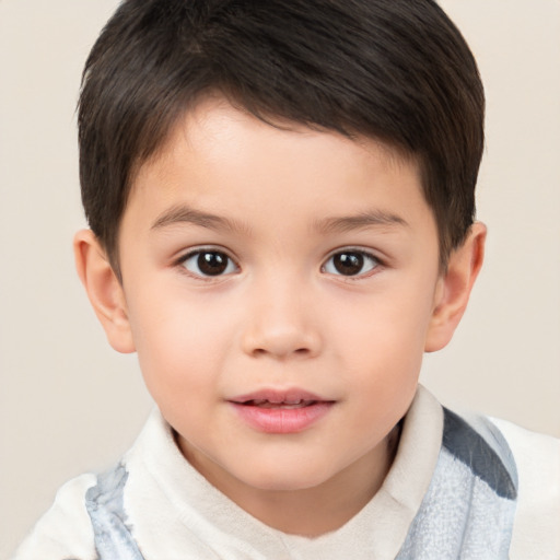 Joyful white child male with short  brown hair and brown eyes