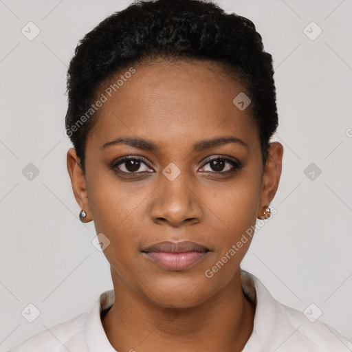 Joyful black young-adult female with short  black hair and brown eyes