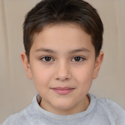 Joyful white child female with short  brown hair and brown eyes