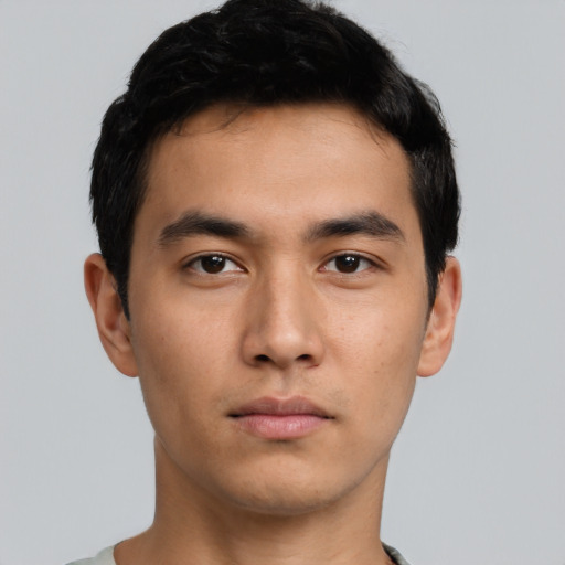 Neutral asian young-adult male with short  black hair and brown eyes