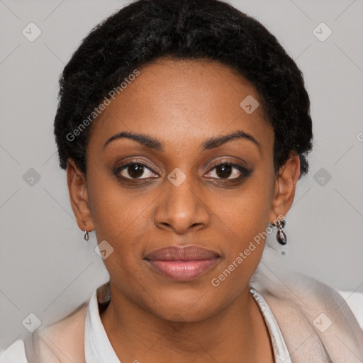 Joyful black young-adult female with short  black hair and brown eyes