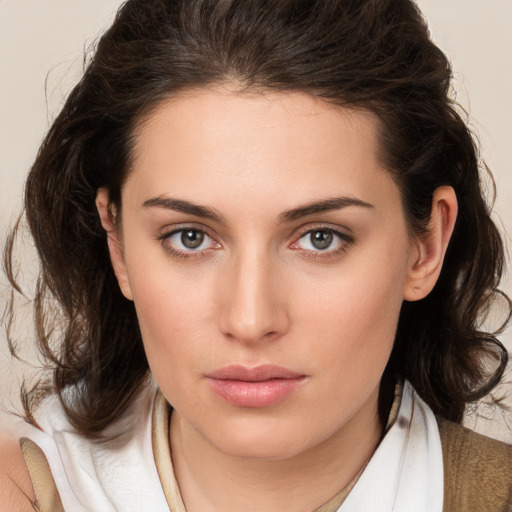 Neutral white young-adult female with medium  brown hair and brown eyes