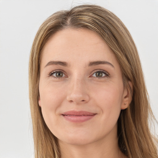 Joyful white young-adult female with long  brown hair and grey eyes