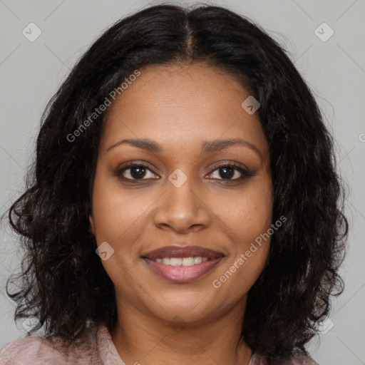 Joyful black young-adult female with medium  brown hair and brown eyes