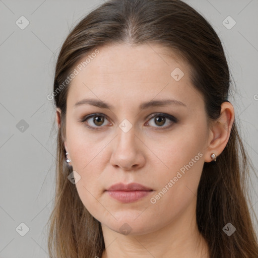 Neutral white young-adult female with long  brown hair and brown eyes