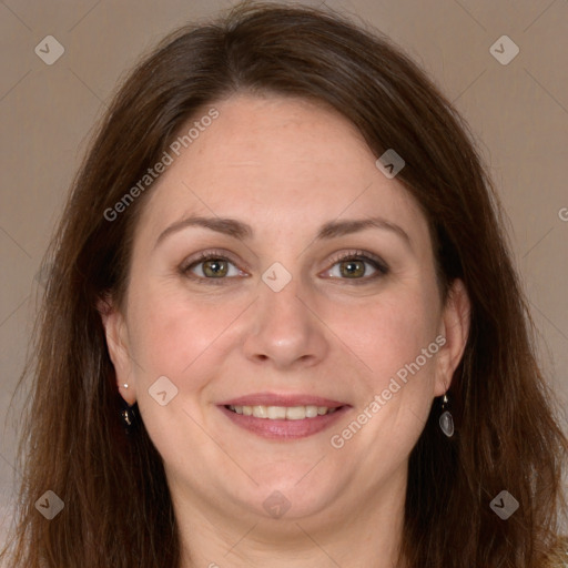 Joyful white adult female with long  brown hair and grey eyes