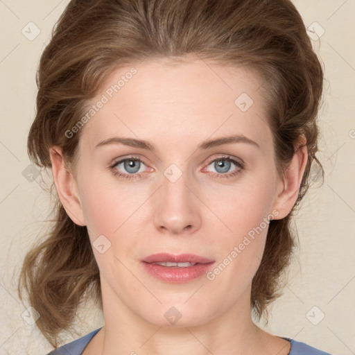 Joyful white young-adult female with medium  brown hair and blue eyes