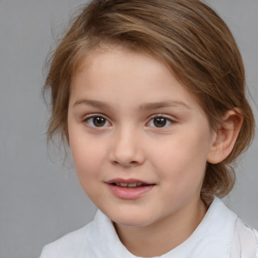 Joyful white child female with medium  brown hair and brown eyes