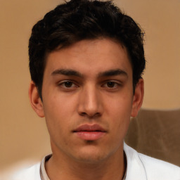 Neutral white young-adult male with short  black hair and brown eyes