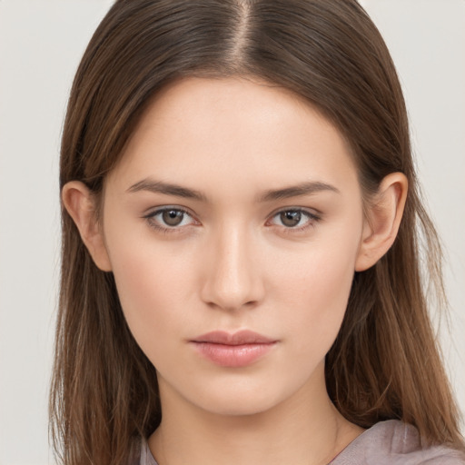 Neutral white young-adult female with long  brown hair and brown eyes