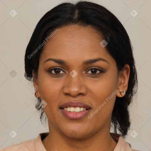 Joyful latino young-adult female with medium  brown hair and brown eyes