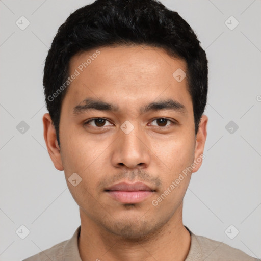 Neutral latino young-adult male with short  black hair and brown eyes