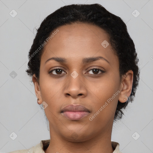 Neutral black young-adult female with short  black hair and brown eyes