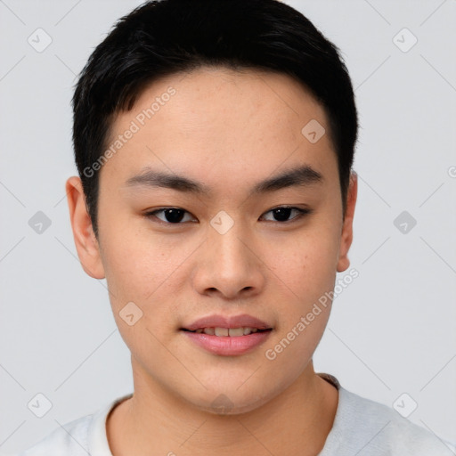 Joyful asian young-adult male with short  brown hair and brown eyes