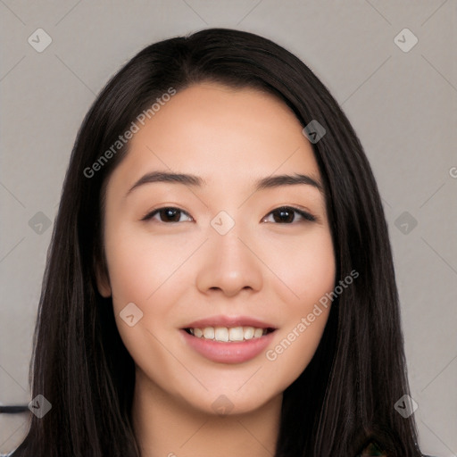 Joyful white young-adult female with long  black hair and brown eyes