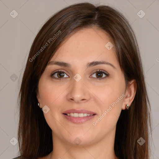 Joyful white young-adult female with long  brown hair and brown eyes