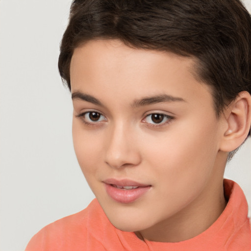 Joyful white child female with short  brown hair and brown eyes