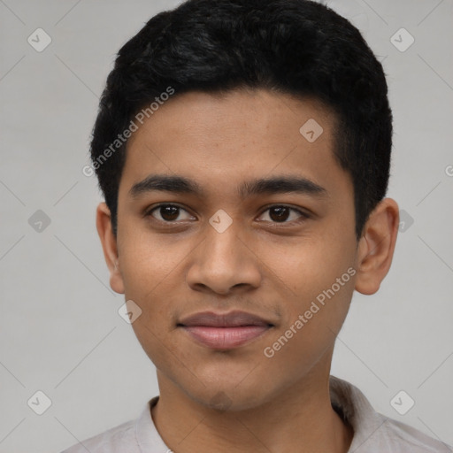 Joyful latino young-adult male with short  black hair and brown eyes