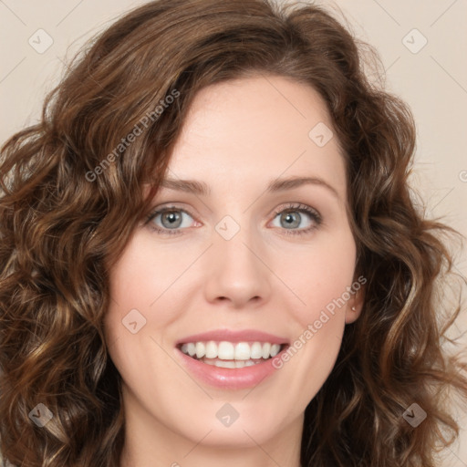 Joyful white young-adult female with long  brown hair and green eyes