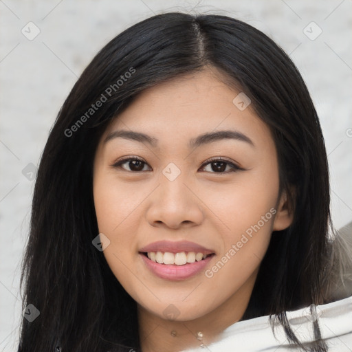 Joyful asian young-adult female with long  black hair and brown eyes