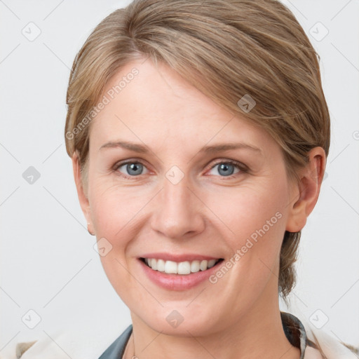 Joyful white young-adult female with medium  brown hair and blue eyes