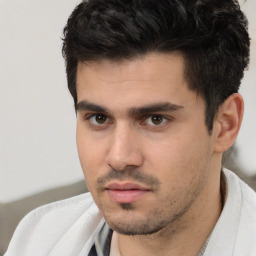 Neutral white young-adult male with short  black hair and brown eyes