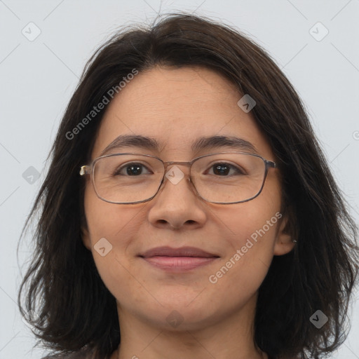 Joyful white adult female with medium  brown hair and brown eyes