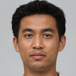 Neutral asian young-adult male with short  black hair and brown eyes