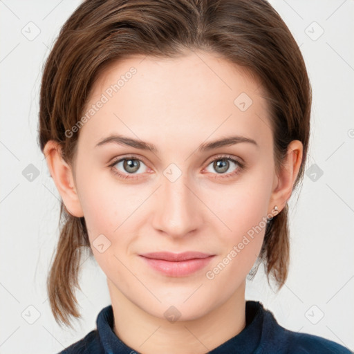 Joyful white young-adult female with medium  brown hair and blue eyes