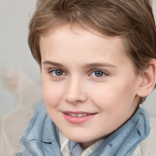 Joyful white child female with short  brown hair and grey eyes