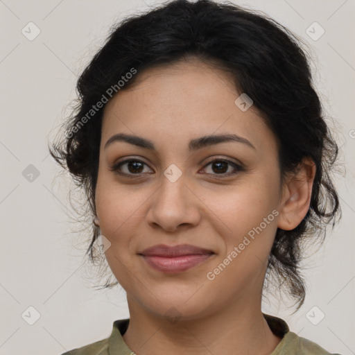 Joyful latino young-adult female with medium  brown hair and brown eyes