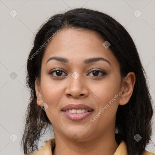 Joyful latino young-adult female with medium  brown hair and brown eyes