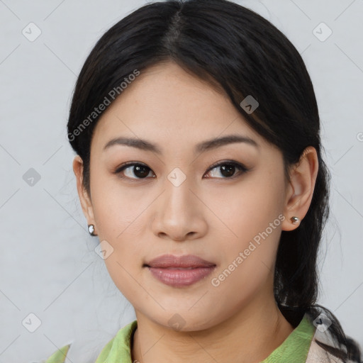 Joyful asian young-adult female with medium  black hair and brown eyes