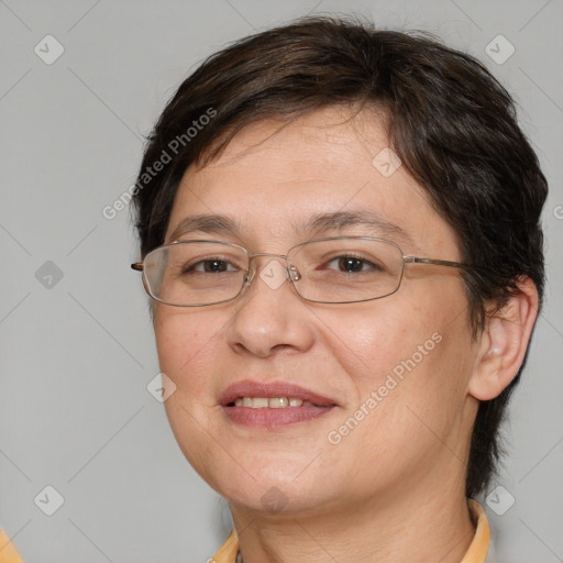 Joyful white adult female with medium  brown hair and brown eyes