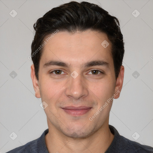 Joyful white young-adult male with short  black hair and brown eyes