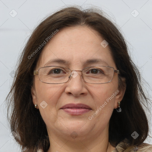 Joyful white adult female with medium  brown hair and grey eyes